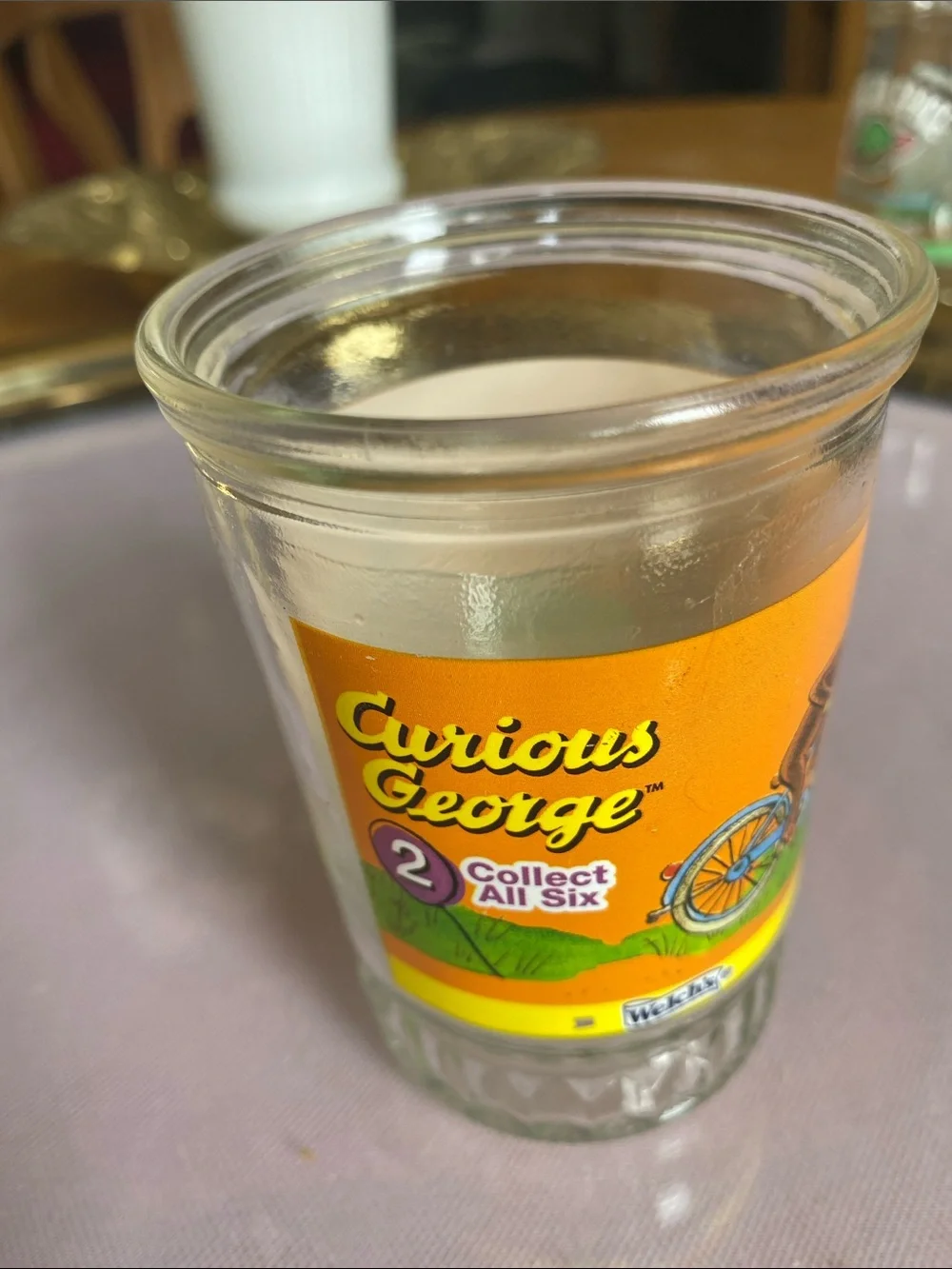 Vintage Welch’s Curious George Glass jelly Jar/ juice glass with Orange Label